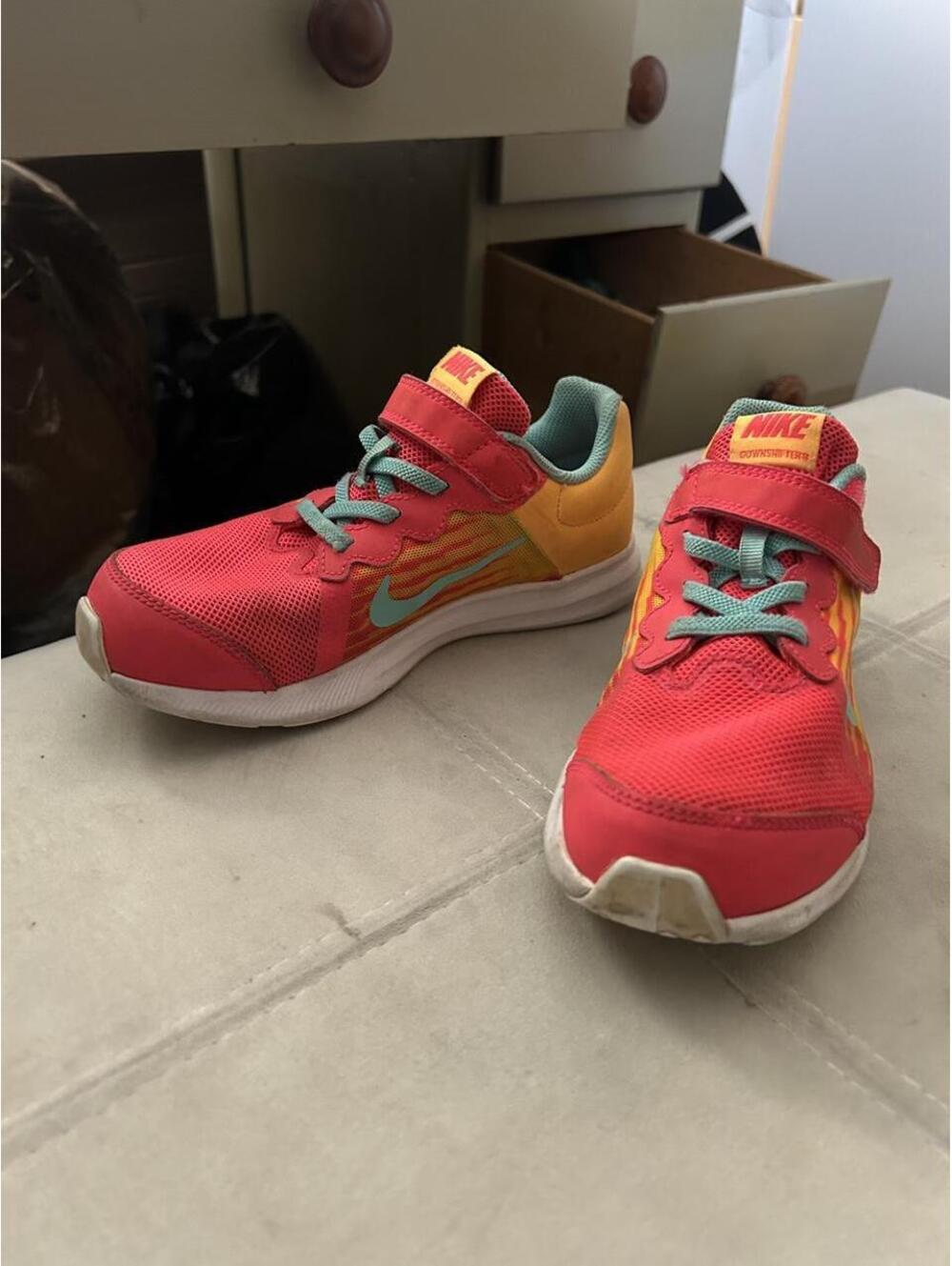 Nike kids sneakers in red, yellow, and teal with a teal Nike swoosh, size US 2 - Picture 3 of 7